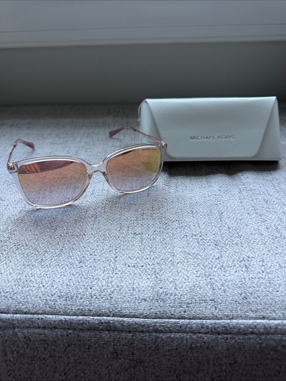 Michael Kors Clear Frame Sunglasses with Pink Gradient Lenses and Gold Accents